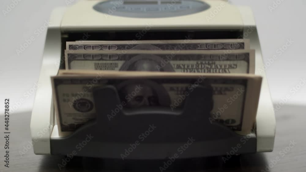 American Dollars In Cash Come Out Of Electronic Counting Machine American Dollars In Cash Come Out Of Electronic Counting Machine