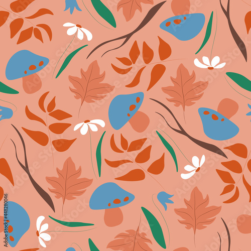 Autumn seamless pattern with leaves, flowers and mushrooms on orange background. Seasonal colors.