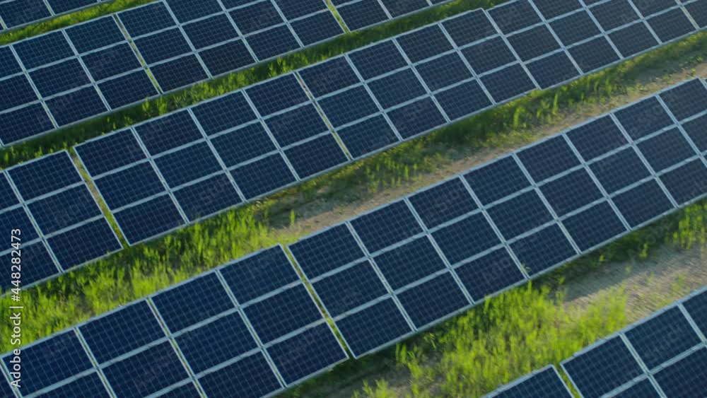 Aerial view of photovoltaic station with many solar panels Aerial view of photovoltaic station with many solar panels