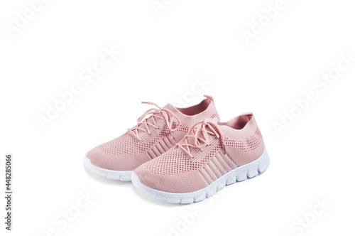 Pink women's shoes from a light soft fabric on a white background.
