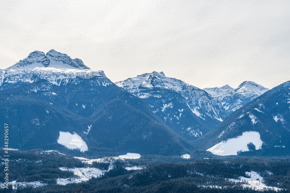 white winter sky over canadian mountains eastern british columbia.