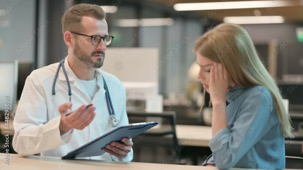 Doctor Talking to Worried Female Patient Doctor Talking to Worried Female Patient