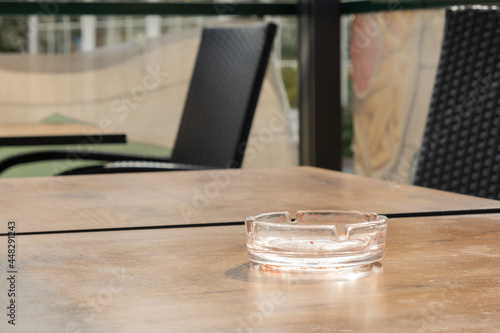 Glass ashtray box on the table at the restaurant