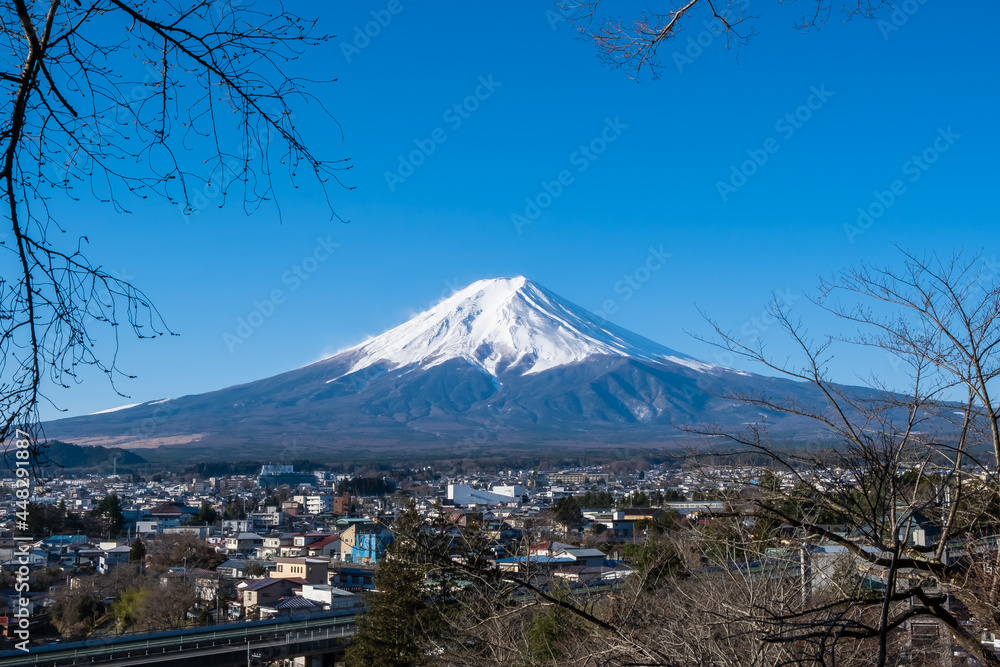 View of Mount Fuji, commonly called Fuji san in Japanese, Mount Fuji's exceptionally symmetrical cone, which is snow capped for about five months a year. It is well known as the symbol of Japan.