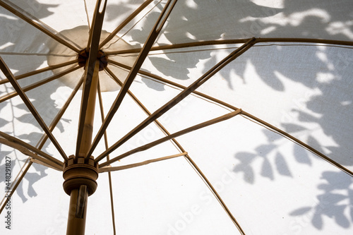 Background of natural bamboo cotton umbrella sunlight outdoor garden home architecture of design decoration