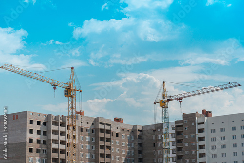 New house construction and cranes.