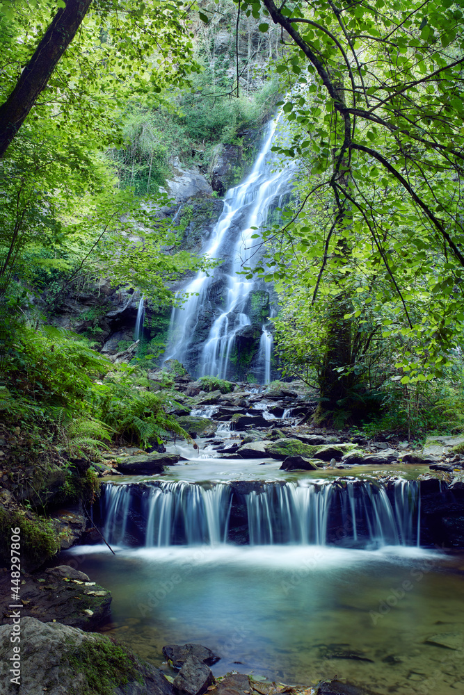 Fototapeta premium Large waterfall formed in the area of Galicia known as Las Hortas waterfall.
