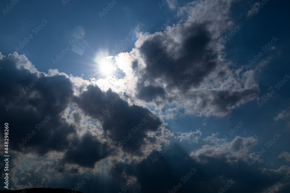 blue sky with clouds. Sky background. Photo. Sunlight. 
