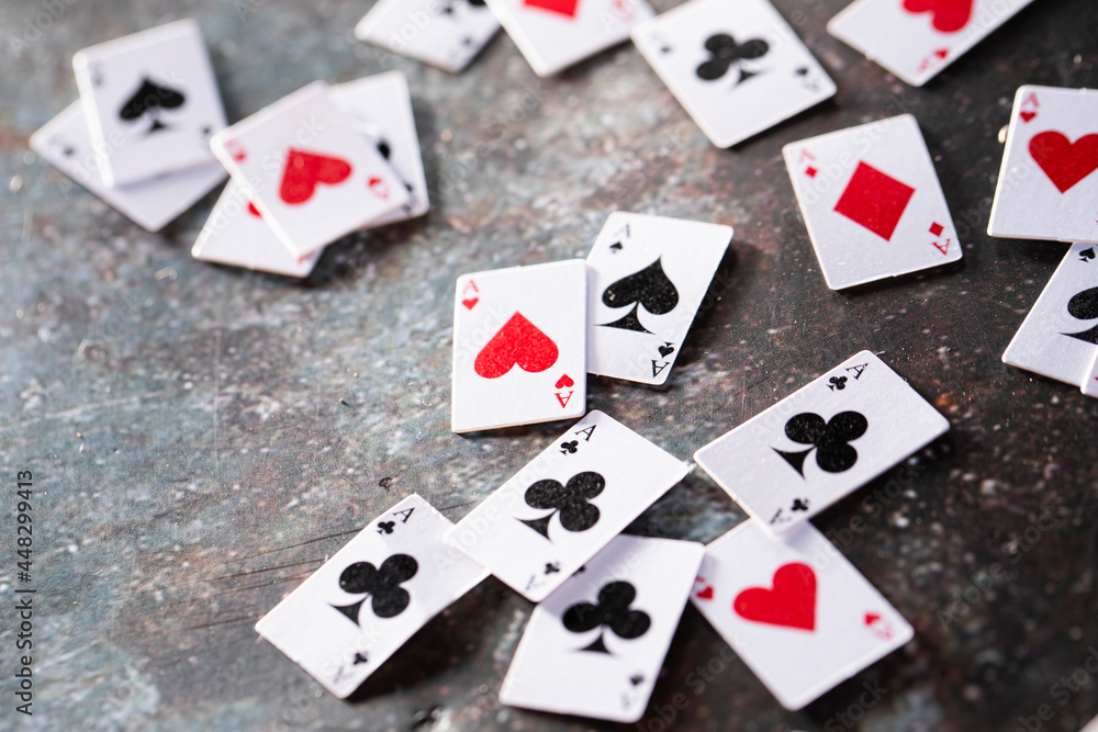 playing cards on a black playing cards on a black