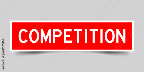 Square label sticker with word competition in red color on gray background