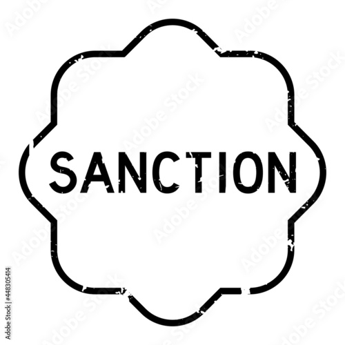 Grunge black sanction word rubber seal stamp on white background