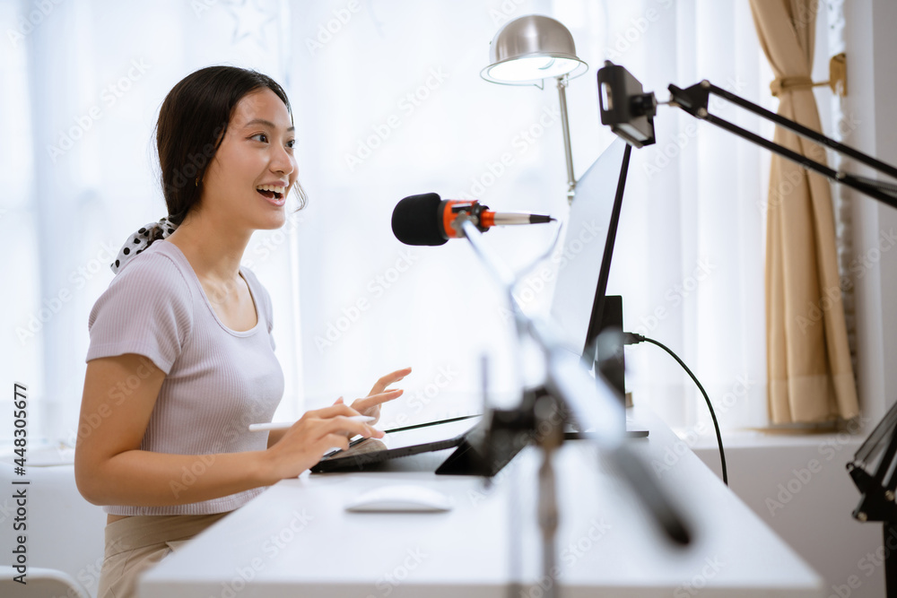 Asian woman Teaching online at home to students Asian woman Teaching online at home to students