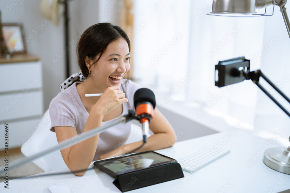 Asian woman Teaching online at home to students Asian woman Teaching online at home to students