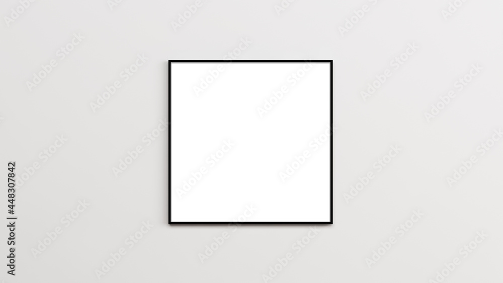 Square frame mockup. Black thin border square frame on the empty white wall. Square frame mockup. Black thin border square frame on the empty white wall.