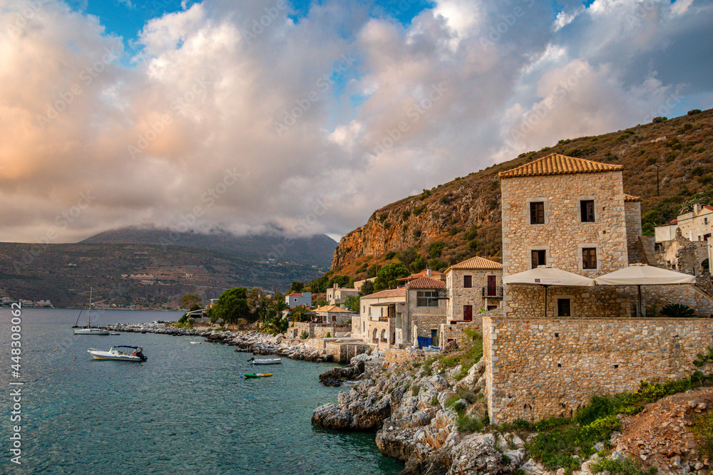 Scenic view from the picturesque seaside village Limeni. Traditional houses and colorful stoned buildings in Limeni, Mani area, Laconia, Greece