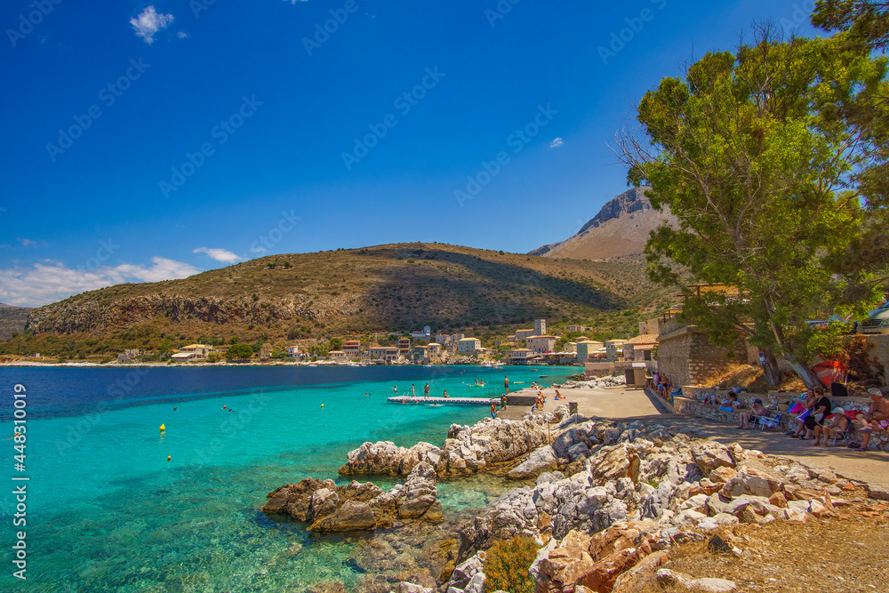 Fototapeta premium Scenic view from the picturesque seaside village Limeni. Traditional houses and colorful stoned buildings in Limeni, Mani area, Laconia, Greece