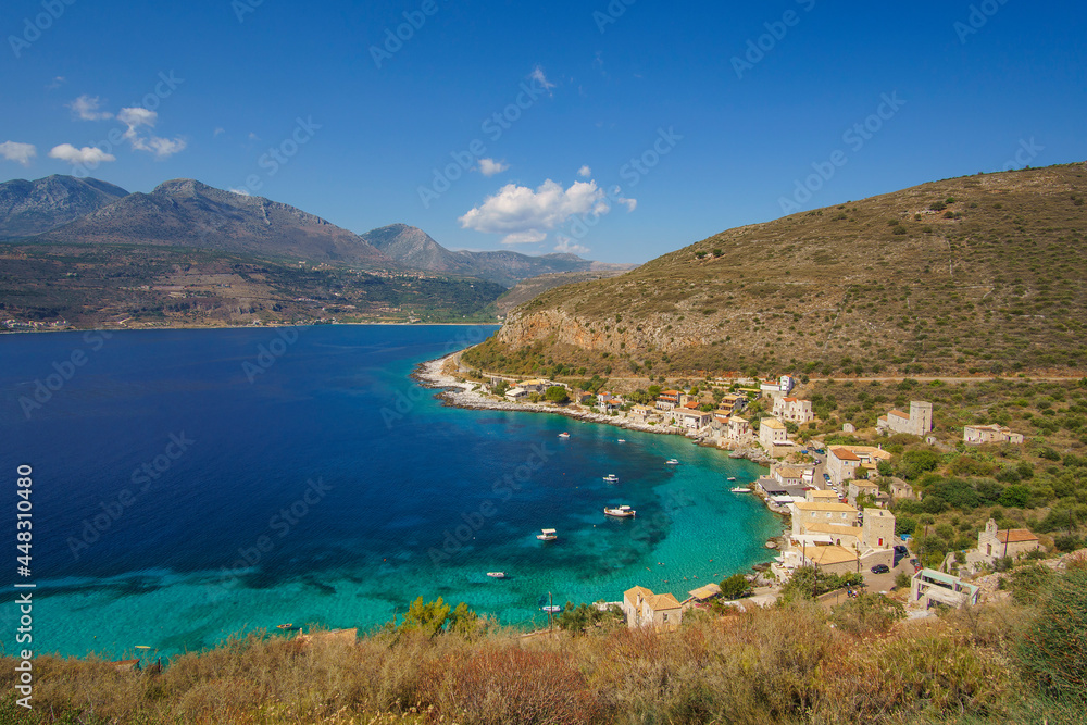 Scenic view from the picturesque seaside village Limeni. Traditional houses and colorful stoned buildings in Limeni, Mani area, Laconia, Greece