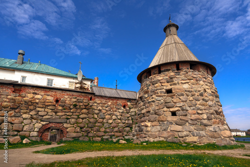 View of the Archangelsk Tower and the Archangelsk Gate in the wall of the Spaso-Preobrazhensky Solovetsky Monastery on a sunny summer day, Solovetsky Island, Arkhangelsk region, Russia