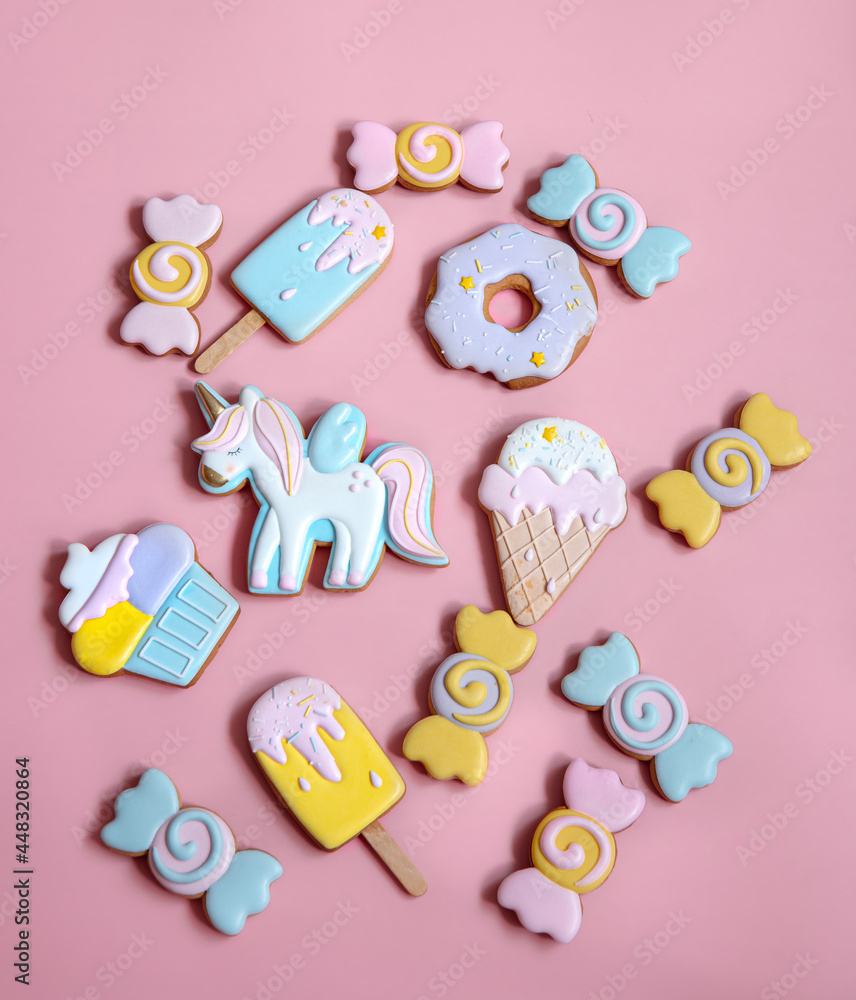 Colorful gingerbread cookies in colored glaze of different shapes.