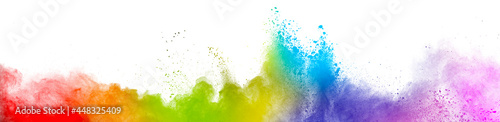 Colorful rainbow holi paint. Vivid color powder explosion isolated on white wide panorama background.