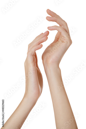 Beautiful female hands isolated on white background.