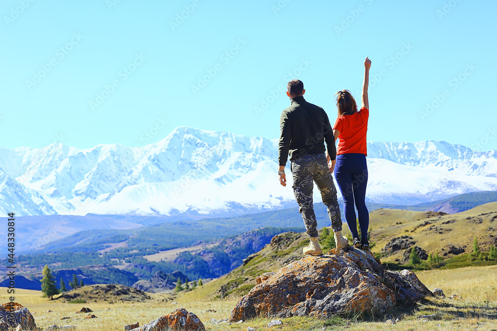 Fototapeta premium couple hands up mountains, landscape adventure active view