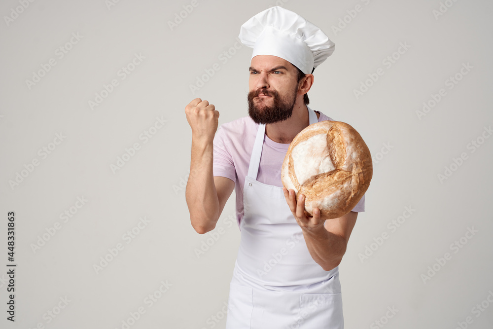 male chef holding bread in his hands cooking baker professional male chef holding bread in his hands cooking baker professional