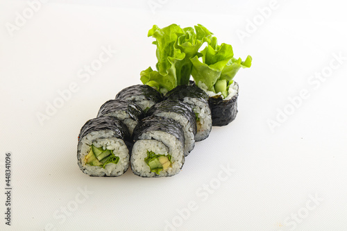 Japanese maki with cucumber and salad