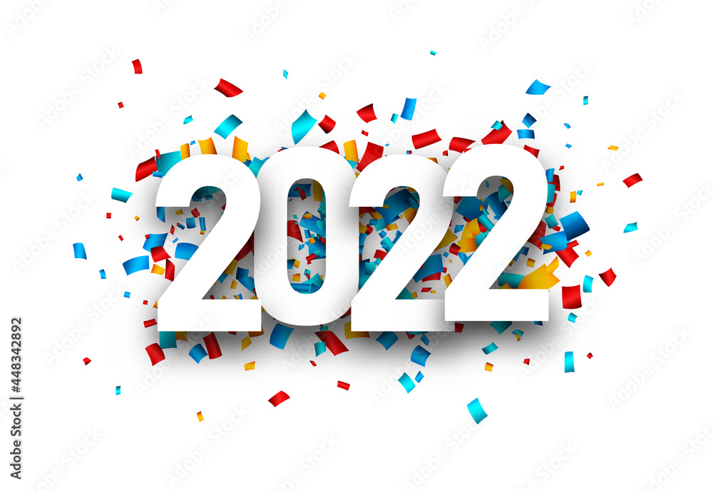 2022 white sign over colourful confetti. 2022 white sign over colourful confetti.