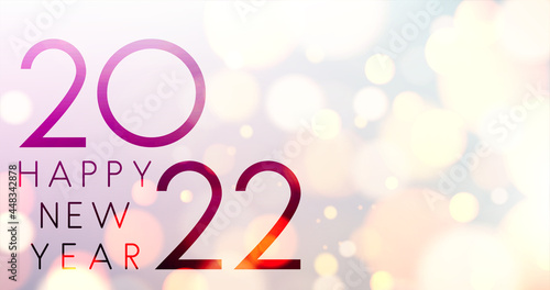 2022 sign on fogged blurred bubbles background.