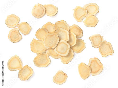 American ginseng slices isolated on white background, top view