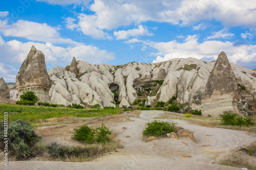 Amazing Volcanic rock formations known as Love Valley or Fairy Chimneys in Cappadocia, Turkey. Mushroom Valley one of attractions in Goreme National Park, Turkey. Mountains with rooms inside