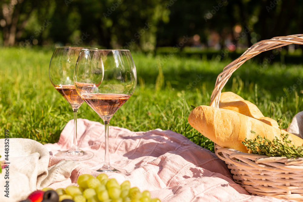 Fototapeta premium Wine glasses on a summer picnic