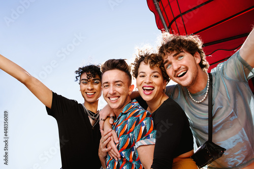Young group of friends having fun together photo