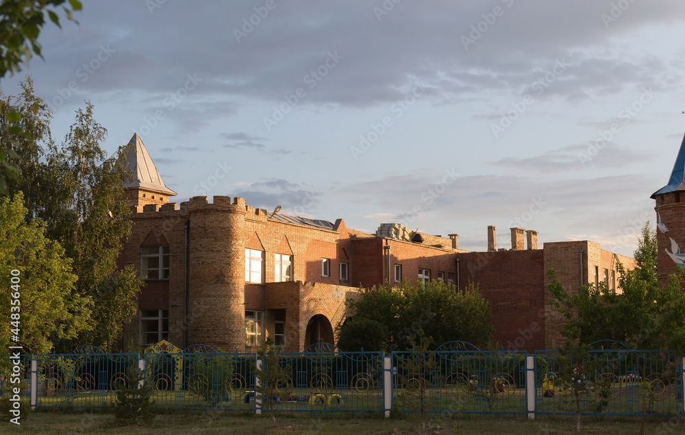 Fototapeta premium Beautiful views of the buildings in the center of the city of Kokshetau of the Republic of Kazakhstan in summer