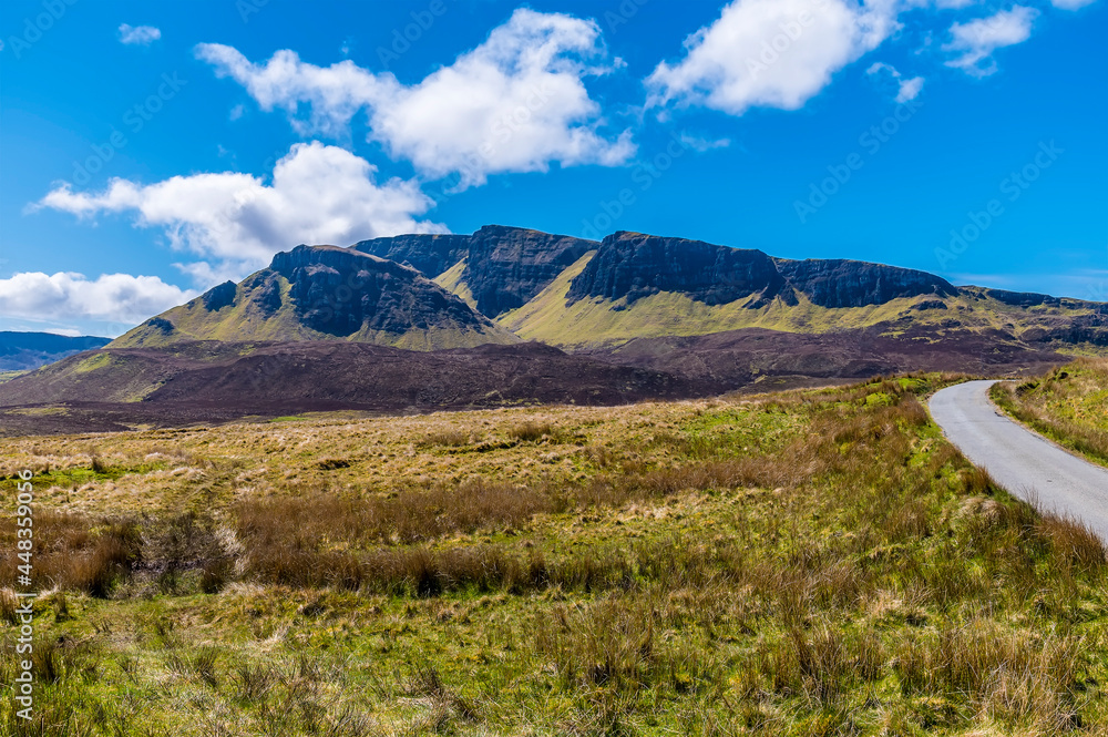 A view towards the impressive, rugged Quiraing Mountains on the Isle of Skye, Scotland on a summers day