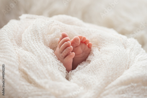 Cute  baby lying on the white  blanket. © chompoo
