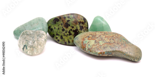 Polished semi precious stones isolated on white background 