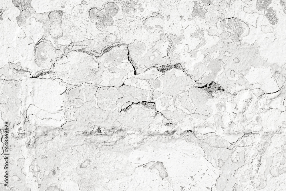 Surface texture of white concrete wall, cement pattern with cracks background with space to copy