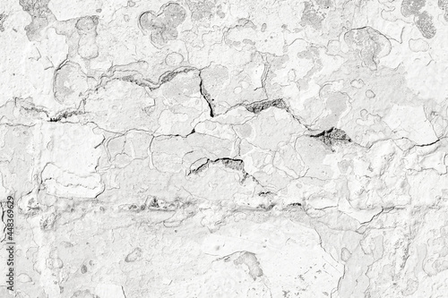 Surface texture of white concrete wall, cement pattern with cracks background with space to copy