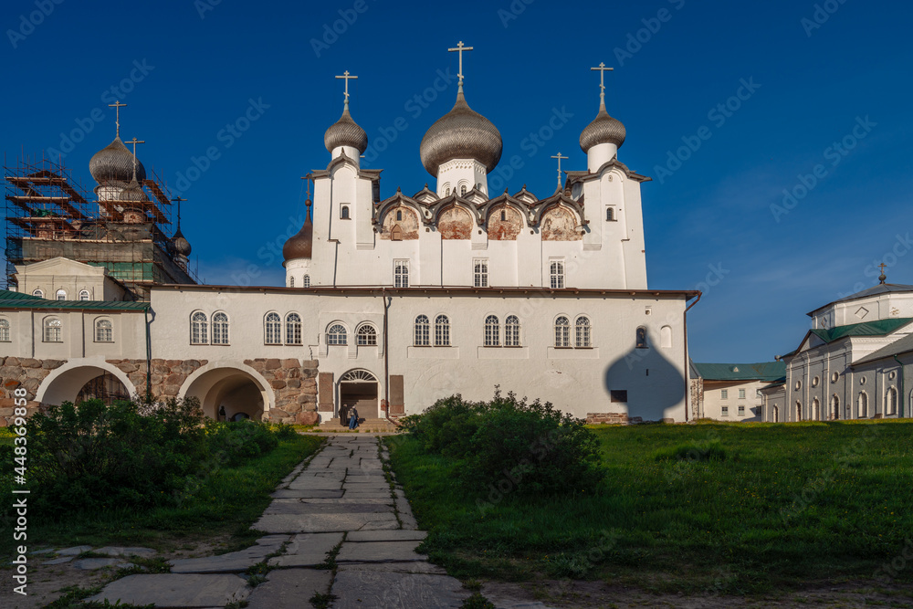View of the Transfiguration Cathedral, St. Philip's Church and St. Nicholas Church under restoration in the Solovetsky Monastery on a sunny cloudless summer day, Solovetsky Island, Arkhangelsk Region