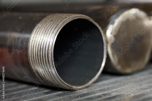 Fotografie Clean fitting on a metal pipe in detail.