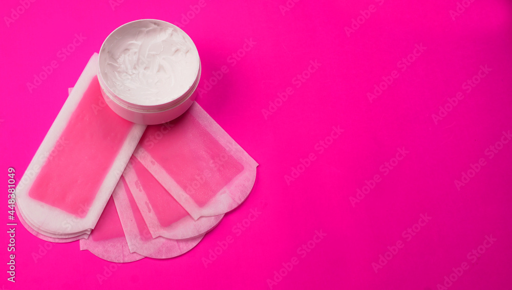 Set of different means for epilation on a colored background. Removal of unwanted hair. Modern epilator, wax strips, razor. Set of different means for epilation on a colored background. Removal of unwanted hair. Modern epilator, wax strips, razor.