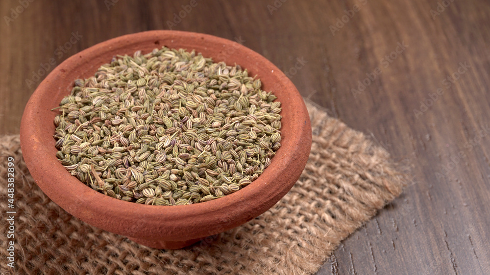 Ajwain Also Know as Ajowan, Caraway or (Trachyspermum Ammi) in spoon and in bowl. Ajwain Also Know as Ajowan, Caraway or (Trachyspermum Ammi) in spoon and in bowl.