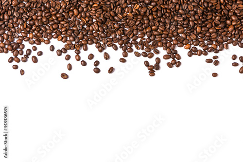 Roasted coffee beans isolated on white background. Frame with coffee beans.