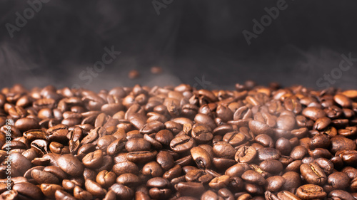 Roasting coffee beans. Steaming coffee beans.