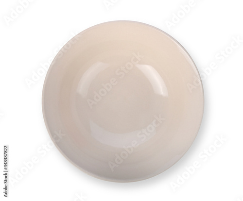 Beige ceramic bowl or ramekin isolated on a white background