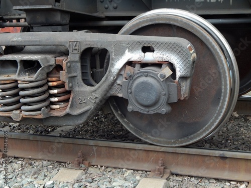 Cargo train wheels close-up. Wheeled trolley of a freight train. 