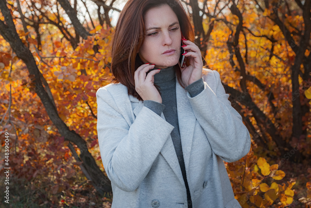 Positive female model in elegant clothes enjoying autumn day. Positive female model in elegant clothes enjoying autumn day.