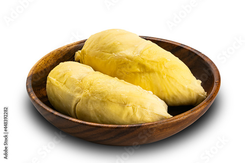 Ripe sweet durian in wooden plate on white background.